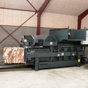 Bramidan HC30 Horizontal Baler showing channel adjustment